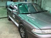 Gia đình bán xe Mazda 626 sản xuất 1992, màu xám, nhập khẩu Nhật Bản