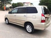 Cần bán Toyota Innova 2.0E năm sản xuất 2014, màu vàng