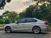 Bán BMW 320i 2013, model 2014, màu bạc