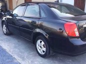 Cần bán xe Daewoo Lacetti sản xuất 2011, màu đen còn mới, 156 triệu