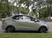 Cần bán lại xe Hyundai Grand i10 đời 2015, màu bạc số sàn