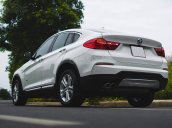 Bán xe BMW X4 màu trắng sản xuất 2014, nội thất kem