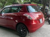 Cần bán xe Suzuki Swift sản xuất năm 2014, màu đỏ, xe nhập số tự động, giá 348tr