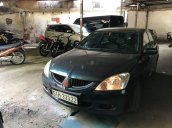 Cần bán lại xe Mitsubishi Lancer sản xuất 2003 còn mới