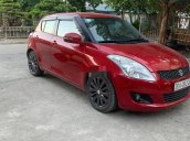 Cần bán xe Suzuki Swift sản xuất năm 2014, màu đỏ, xe nhập số tự động, giá 348tr