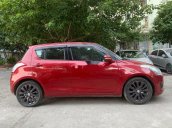 Cần bán xe Suzuki Swift sản xuất năm 2014, màu đỏ, xe nhập số tự động, giá 348tr