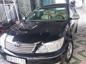 Bán xe Toyota Camry đời 2002, màu đen 