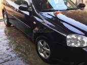 Cần bán gấp Daewoo Lacetti đời 2009, màu đen xe gia đình 