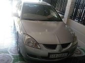 Bán Mitsubishi Lancer 2005, màu bạc xe gia đình