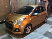 Bán ô tô Hyundai Grand i10 sản xuất năm 2014, màu vàng, xe nhập chính chủ