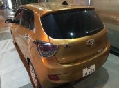 Bán ô tô Hyundai Grand i10 sản xuất năm 2014, màu vàng, xe nhập chính chủ