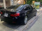 Bán xe BMW 3 Series 320i sản xuất 2012, màu đen, xe nhập, giá 680tr