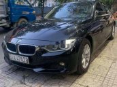 Bán xe BMW 3 Series 320i sản xuất 2012, màu đen, xe nhập, giá 680tr