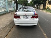 Gia đình bán Mitsubishi Lancer đời 2001, màu trắng