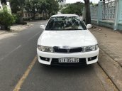 Gia đình bán Mitsubishi Lancer đời 2001, màu trắng