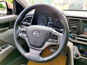 Cần bán Hyundai Elantra đời 2017, màu nâu còn mới, 554 triệu