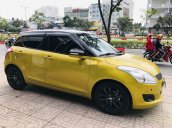 Cần bán xe Suzuki Swift 2017, màu vàng số tự động