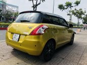 Cần bán xe Suzuki Swift 2017, màu vàng số tự động