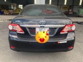 Bán ô tô Toyota Corolla Altis 1.8G đời 2011, màu đen số sàn