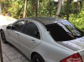 Cần bán Mercedes đời 2004, màu bạc