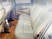 Cần bán lại xe Nissan Grand livina năm sản xuất 2013, màu vàng