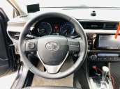 Cần bán gấp Toyota Corolla Altis 1.8G CVT đời 2015, màu đen chính chủ