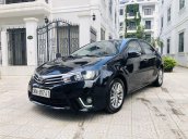 Cần bán gấp Toyota Corolla Altis 1.8G CVT đời 2015, màu đen chính chủ