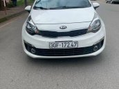 Cần bán xe Kia Rio 2015 MT, màu trắng