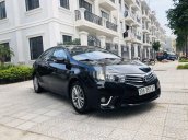 Cần bán gấp Toyota Corolla Altis 1.8G CVT đời 2015, màu đen chính chủ