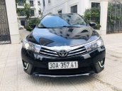 Cần bán gấp Toyota Corolla Altis 1.8G CVT đời 2015, màu đen chính chủ