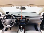 Cần bán gấp Toyota Corolla Altis 1.8G CVT đời 2015, màu đen chính chủ