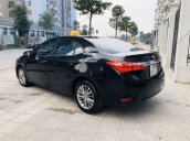 Cần bán gấp Toyota Corolla Altis 1.8G CVT đời 2015, màu đen chính chủ