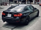 Bán xe BMW 320i 2013, màu đen, giá tốt