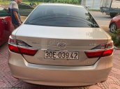 Toyota Camry SX 2015, màu nâu vàng, nội thất da, số tự động, máy xăng