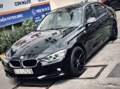 Bán xe BMW 320i 2013, màu đen, giá tốt