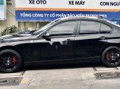 Bán xe BMW 320i 2013, màu đen, giá tốt