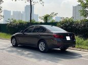 Cần bán xe BMW 320i sản xuất năm 2013 màu đen, giá tốt