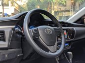 Cần bán nhanh chiếc Toyota Corolla Altis sản xuất năm 2014, màu nâu