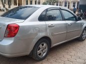 Cần bán xe Daewoo Lacetti sản xuất 2010, màu bạc chính chủ