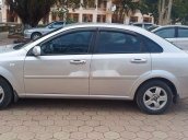 Cần bán xe Daewoo Lacetti sản xuất 2010, màu bạc chính chủ