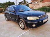 Bán Ford Laser GHIA 1.8 năm sản xuất 2002, màu đen, giá tốt