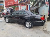 Bán ô tô Toyota Camry đời 2004, màu đen chính chủ, giá tốt