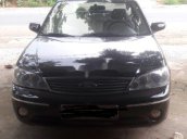 Cần bán Ford Laser 2004, màu đen chính chủ