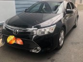 Cần bán xe Toyota Camry năm sản xuất 2015, màu đen xe gia đình, giá 819tr