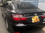 Cần bán xe Toyota Camry năm sản xuất 2015, màu đen xe gia đình, giá 819tr