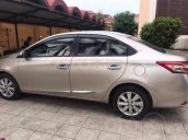 Cần bán ô tô Toyota Vios G số tự động sản xuất 2014, màu vàng cát