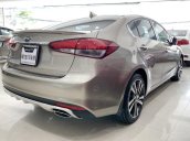 Bán xe Kia Cerato 1.6 AT model 2017, màu vàng cát, số tự động, lăn bánh 47.000km