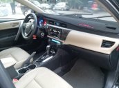 Cần bán xe Toyota Corolla Altis đời 2016, màu đen chính chủ, giá 620tr