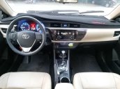 Cần bán xe Toyota Corolla Altis đời 2016, màu đen chính chủ, giá 620tr