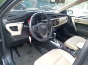 Cần bán xe Toyota Corolla Altis đời 2016, màu đen chính chủ, giá 620tr